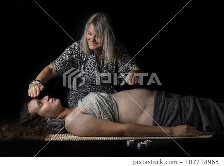 woman and energy healing woman and energy healing 107218963
