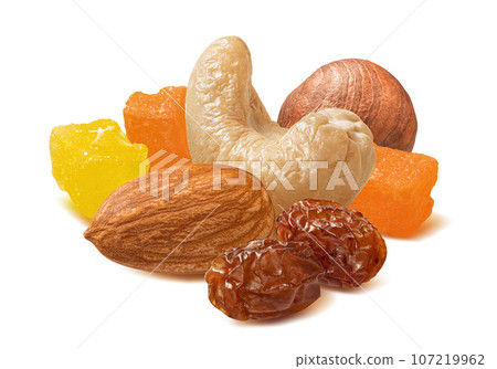 Hazelnut, cashew, almond nuts, raisins and candied fruit isolated on white background 107219962
