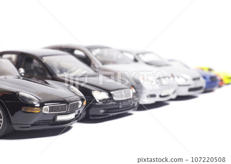 parking toy cars in a row isolated on white 107220508