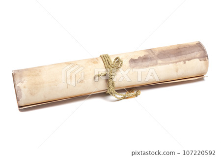 scroll of antique paper tied with a golden rope scroll of antique paper tied with a golden rope 107220592