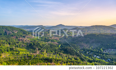 View of the summer landscape of the Lusatian Mountains from the viewpoint on the Klic Mountain. Czech Republic View of the summer landscape of the Lusatian Mountains from the viewpoint on the Klic Mountain. Czech Republic 107221302