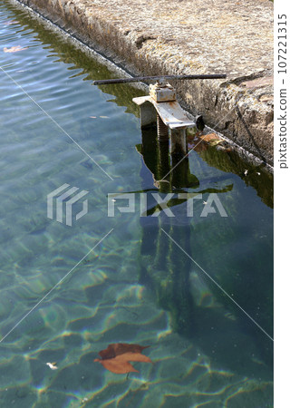 An irrigation basin valve with clear water 107221315