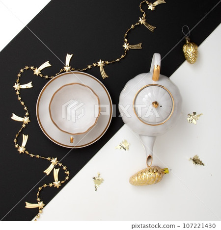 New Year's photo. Kettle and cup on the festive 107221430