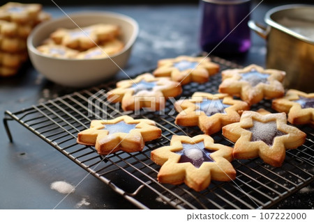 homemade dreidel cookies on a cooling rack 107222000