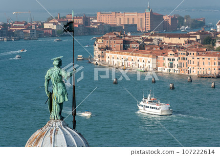 St George Statue on the Dome of Church San Giorgio Maggiore in Venice 107222614