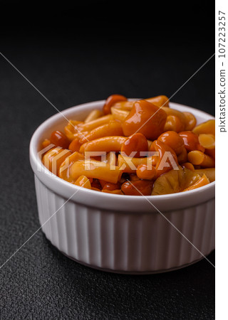 Delicious pickled honey mushrooms with salt and spices 107223257