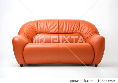 Modern orange sofa with pillows isolated on white background.  107223606