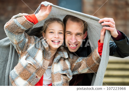 12 yo blonde daugther having fun with her 42 yo father, covered under a blanket 12 yo blonde daugther having fun with her 42 yo father, covered under a blanket 107223966
