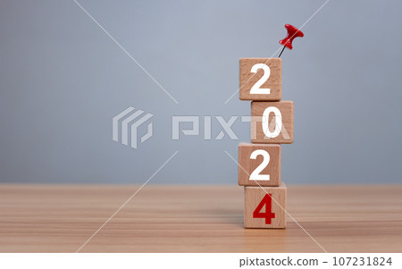 Wooden blocks lined up with the letters 2024. Represents the goal setting for 2024, the concept of a start. financial planning development strategy business goal setting Wooden blocks lined up with the letters 2024. Represents the goal setting for 2024, the concept of a start. financial planning development strategy business goal setting 107231824