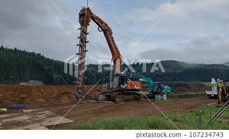Heavy machinery at the construction site 107234743