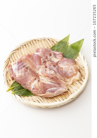 Chicken thigh on a rack, white background 107235265