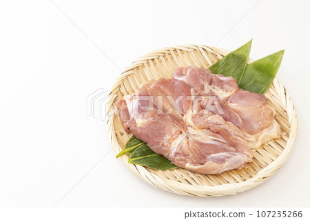 Chicken thigh on a rack, white background 107235266
