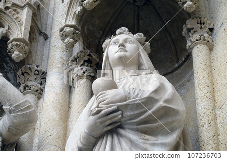 Statue of Saint Barbara on the portal of the cathedral dedicated to the Assumption of Mary in Zagreb Statue of Saint Barbara on the portal of the cathedral dedicated to the Assumption of Mary in Zagreb 107236703