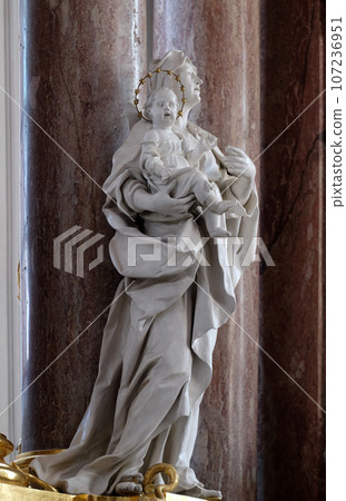 Saint Anne statue on the main altar in Amorbach Benedictine monastery church in Lower Franconia, Bavaria, Germany Saint Anne statue on the main altar in Amorbach Benedictine monastery church in Lower Franconia, Bavaria, Germany 107236951