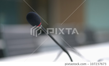 Close up microphone on table meeting room. Close up microphone on table meeting room. 107237673
