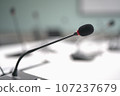 Close up microphone on table meeting room. 107237679