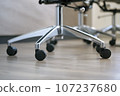 Close up chair castor wheel in modern office meeting room or business working 107237680