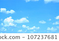 blue sky background with clouds 107237681