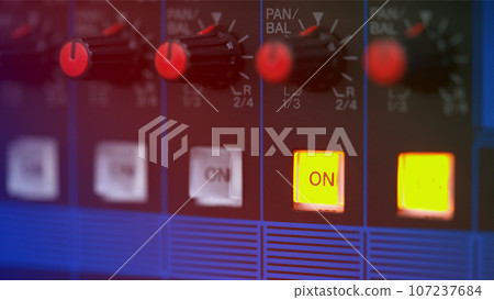 close-up audio mixing console, Selective focus. mixing and mastering tone control. close-up audio mixing console, Selective focus. mixing and mastering tone control. 107237684