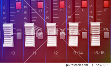 close-up audio mixing console, Selective focus. mixing and mastering tone control. close-up audio mixing console, Selective focus. mixing and mastering tone control. 107237685