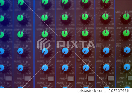 close-up audio mixing console, Selective focus. mixing and mastering tone control. close-up audio mixing console, Selective focus. mixing and mastering tone control. 107237686