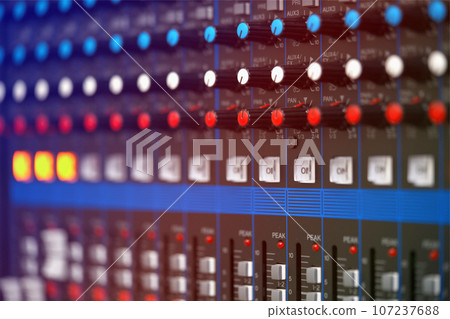 close-up audio mixing console, Selective focus. mixing and mastering tone control. close-up audio mixing console, Selective focus. mixing and mastering tone control. 107237688