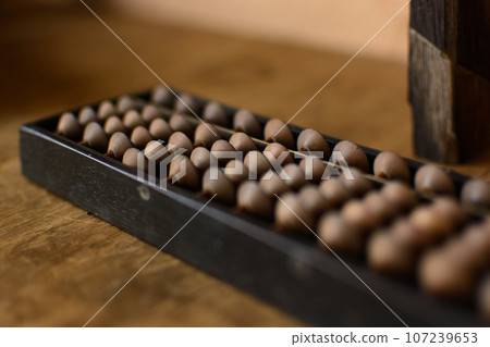 Abacus blurred image photo Abacus blurred image photo 107239653