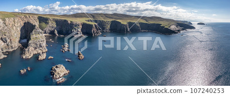 Aerial view of the cliffs near the lighthouse on the island of Arranmore in County Donegal, Ireland Aerial view of the cliffs near the lighthouse on the island of Arranmore in County Donegal, Ireland 107240253