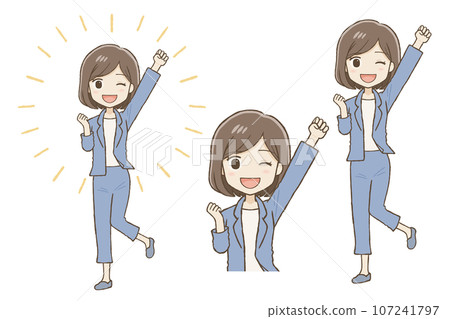 A woman in a pants suit posing enthusiastically with her fist raised A woman in a pants suit posing enthusiastically with her fist raised 107241797