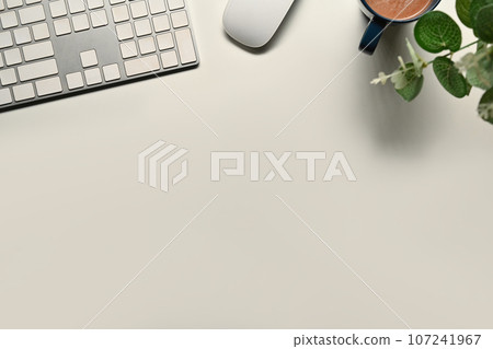 Top view blank notepad, glasses, coffee cup and keyboard on white office. Copy space for your text 107241967