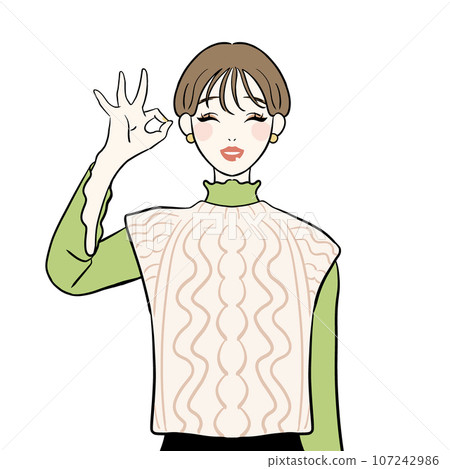 A woman making an okay sign with her hands 107242986