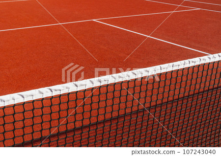 Close-up of tennis net on the court background Close-up of tennis net on the court background 107243040
