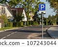 Parking lot sign on the street in residential area 107243044