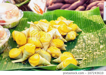 Thai dessert Toddy palm cake in leaf cup Thai dessert Toddy palm cake in leaf cup 107243610