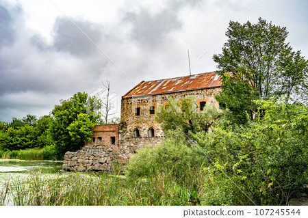 Photography on theme outstanding building beautiful brick old water mill Photography on theme outstanding building beautiful brick old water mill 107245544