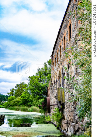 Photography on theme outstanding building beautiful brick old water mill Photography on theme outstanding building beautiful brick old water mill 107245551