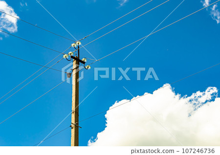 Power electric pole with line wire on colored background close up 107246736