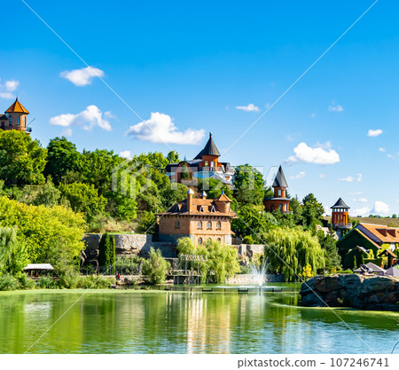 Photography on theme ancient brick castle with large tower Photography on theme ancient brick castle with large tower 107246741
