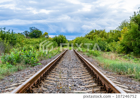 Photography to theme railway track after passing train on railroad 107246752