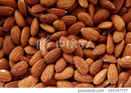 Almonds full of screen 107247737