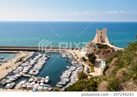 Sea landscape at Sperlonga, Lazio, Italy. Scenic resort town village with nice sand beach Sea landscape at Sperlonga, Lazio, Italy. Scenic resort town village with nice sand beach 107249283