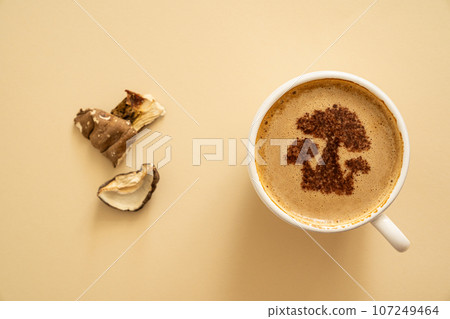 Mushroom coffee concept - mushroom shaped art on coffee cup Mushroom coffee concept - mushroom shaped art on coffee cup 107249464