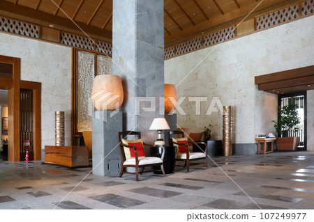 Lobby entrance of The Ritz-Carlton Okinawa, a luxury resort hotel in tropical Okinawa 107249977