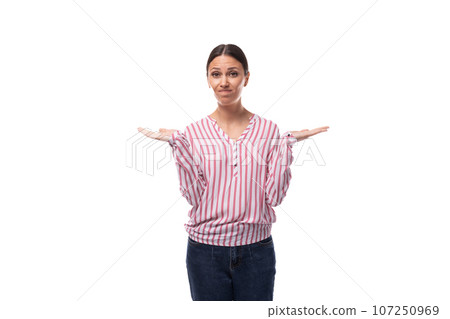 young business lady with a ponytail hairstyle is dressed in a striped blouse on a white background young business lady with a ponytail hairstyle is dressed in a striped blouse on a white background 107250969