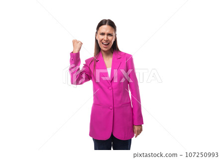 young successful business woman with straight flowing hair dressed in a crimson jacket young successful business woman with straight flowing hair dressed in a crimson jacket 107250993