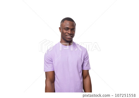 portrait of a young handsome american man in a light t-shirt on a white background with copy space 107251558