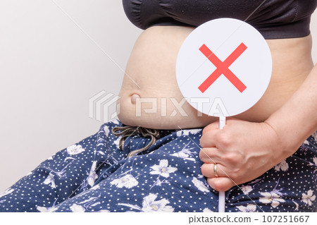 [Debeso plate with an overweight housewife] 107251667