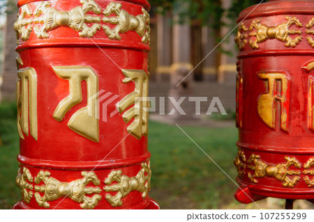 prayer wheels at the Datsan Gunzechoinei Buddhist temple prayer wheels at the Datsan Gunzechoinei Buddhist temple 107255299