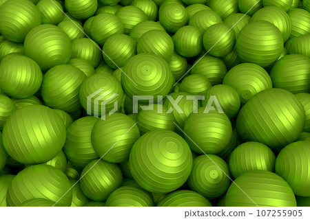Pile of green fitness ball or fitball falling on white background 107255905