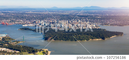 Aerial view of Downtown Vancouver and Stanley Park on West Coast of Pacific Ocean. BC, Canada Aerial view of Downtown Vancouver and Stanley Park on West Coast of Pacific Ocean. BC, Canada 107256186